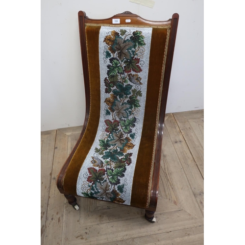 133 - Late Victorian mahogany framed easy chair on turned supports with upholstered seat and back with vin... 