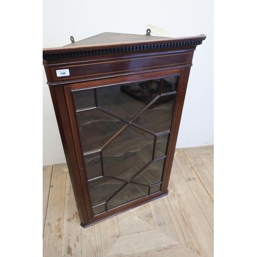 146 - Edwardian mahogany inlaid corner cupboard enclosed by single glazed door, with three shelves to the ... 