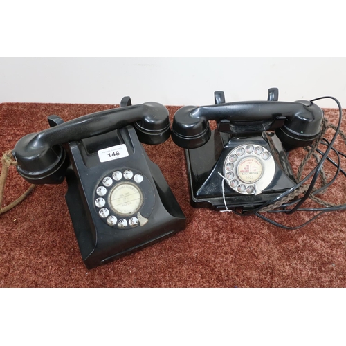 148 - Vintage black Bakelite cased telephone, and another similar with tapering form (2)