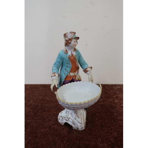 151 - KPM porcelain figure of a gentleman with twin handled basket