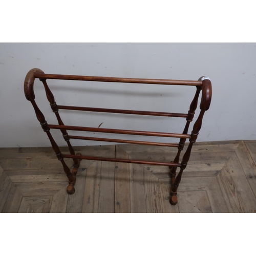 180 - Late Victorian stained beech country house style towel rail on turned supports (width 72cm)