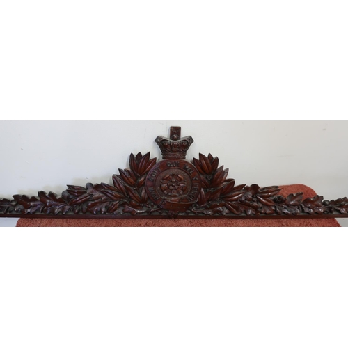 194 - Carved wood Victorian pediment with Victorian crowned badge within laurels of oak leaves (length 102... 