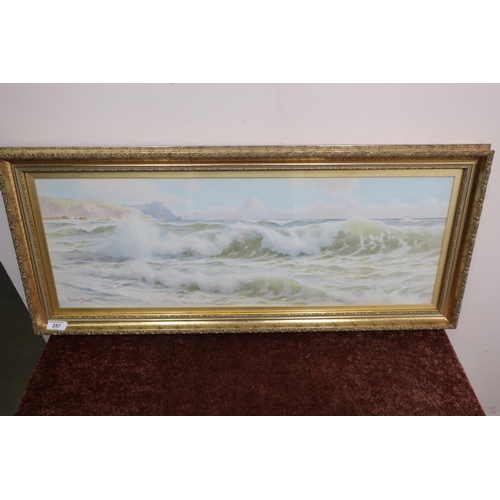 257 - Gilt framed watercolour of coastal scene by Ernest Stuart (86cm x 37cm including frame)