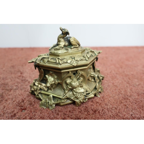 313 - 19th C gilt bronze table casket, the hinged lid mounted with a figure of a seated Lurcher type dog, ... 