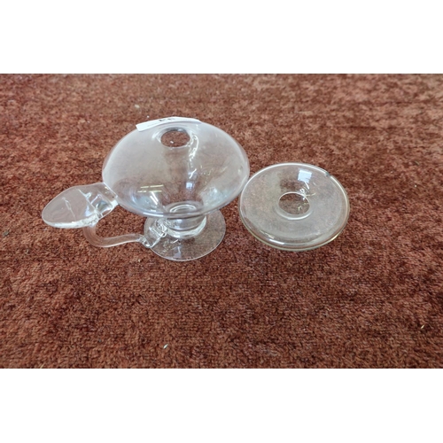 34 - Small Georgian clear glass oil lamp with large thumb mount handle, the body of tapering form on circ... 