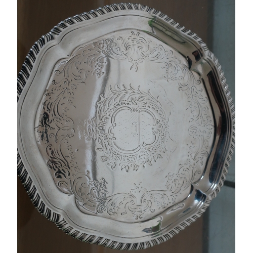 385 - London 1763 silver hallmarked armorial salver with engraved detail and traces of faint central armor... 