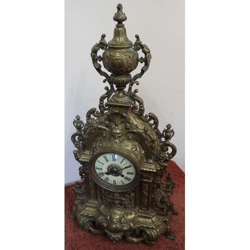 63 - Elaborate brass cased Victorian mantel clock with striking movement (64cm high)