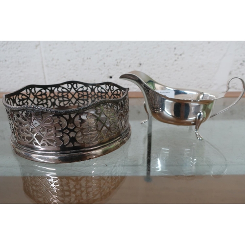 393 - Silver plated bottle coaster with turned wood base and a Sheffield silver hallmarked Viners sauce bo... 