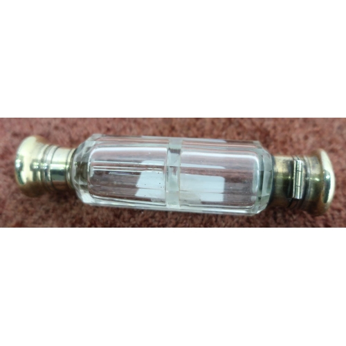 405 - 19th C faceted glass double ended scent bottle, with one screw off and one hinged gilt metal tops (o... 