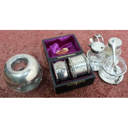 417 - Two silver hallmarked napkin rings, Birmingham silver hallmarked cruet set on shamrock leaf shaped s... 