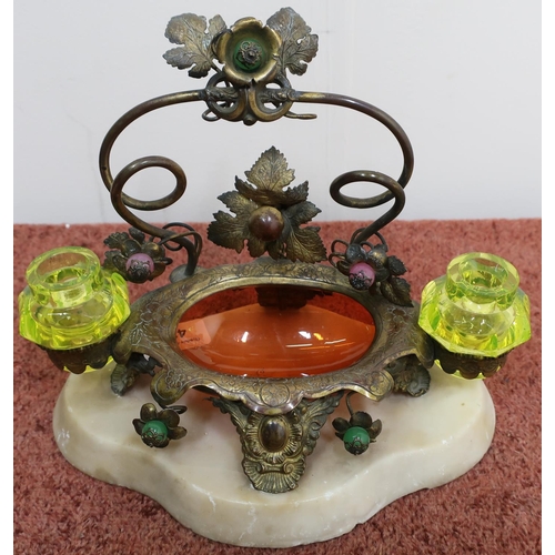 423 - Unusual 19th/20th C Eastern style desk stand with gilt metal set with cabochon stone in the form of ... 