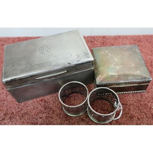 424 - London silver hallmarked cigarette box with hinged detail and engine turned detail and a pair of sil... 