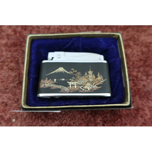 168 - Boxed Prince Muselite lighter Pat No. 2347541-2 with Japanese lacquered detail to the body, in origi... 