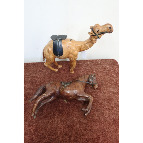 170 - Spanish style moulded leather figure of a rearing horse, and another similar of a camel (2)