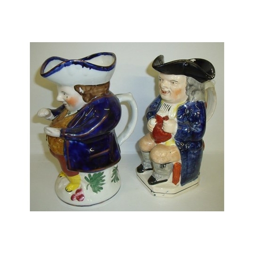 82 - 19th C Toby jug and one other similar Toby jug (height 24cm)