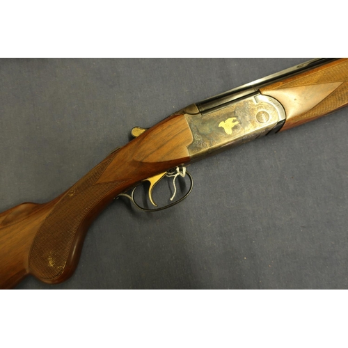 598 - Cased Rottweil 28 bore over and under ejector shotgun with 30 inch barrels, multi chokes, with singl... 