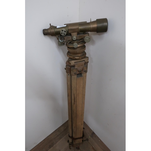 111 - Surveyor's theodolite stamped AH Hall and Bros, London N1 58434, on oak tripod