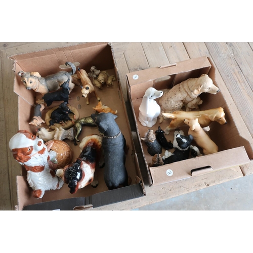 15 - Leonardo resin model of a Rottweiler and a selection of other pottery and resin dog ornament in two ... 