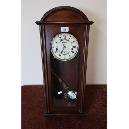 32 - Contemporary mahogany cased wall clock with Westminster chiming movement