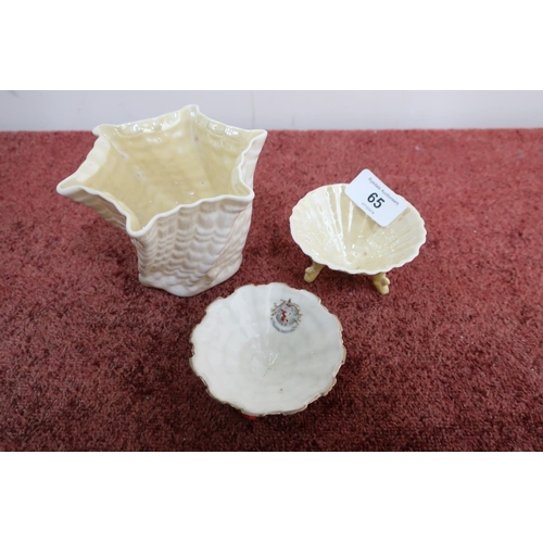 65 - Two pieces of Belleek shell shaped pottery and one other (3)