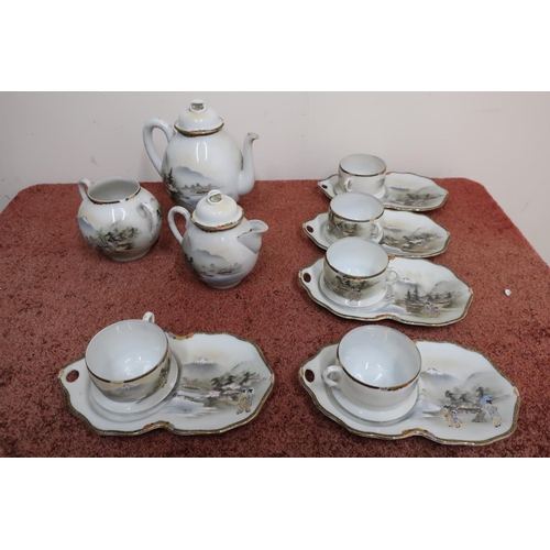 73 - Japanese eggshell tea service decorated with a view of Mount Fuji