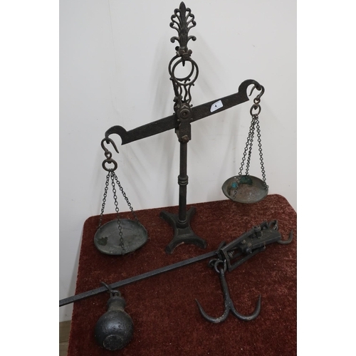 4 - Pair of Victorian cast metal balance scales (lacking pans) and a butchers style hanging scales (2)
