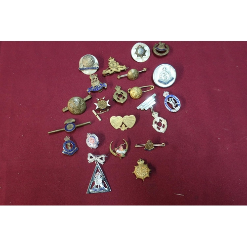 44 - Quantity of various military related sweetheart and other lapel badges and brooches including Mother... 