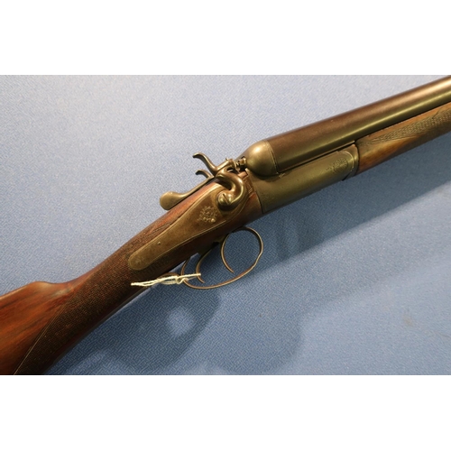 588 - T.Wild 12 bore hammer gun with 30 inch barrels and 14 1/4 inch straight through stock, serial no. 15... 