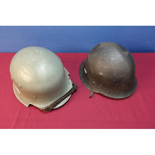 6 - German Third Reich Civil steel helmet with leather liner and chin strap, with later painted detail a... 