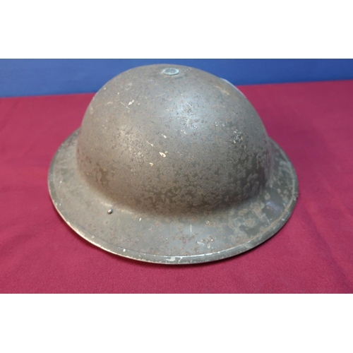 78 - British circa WWII steel helmet with liner and chinstrap