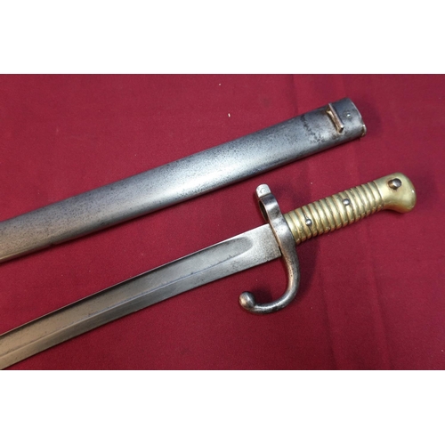 89 - French 1886 patent bayonet complete with steel scabbard No. U11497