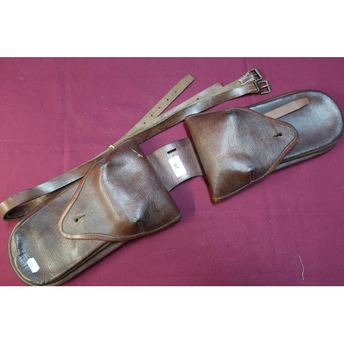 97 - Tan leather double saddle holster with stamp marks 88 and various leather straps
