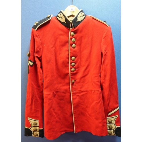 65 - Scots Guards red tunic with insignia for a Lance Corporal Pioneer with brass buttons