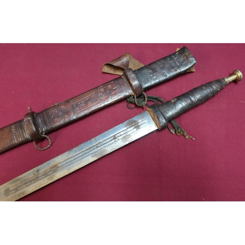 49 - North African Sudanese style sword with 31 inch double edge blade with leather bound grip and leathe... 
