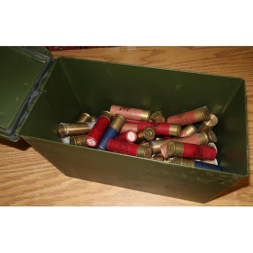 628 - Military style ammo tin containing a quantity of various assorted 8 bore shotgun cartridges includin... 