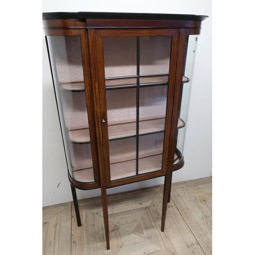 514 - Edwardian mahogany inlaid three tier display cabinet enclosed by a single glazed cupboard door on sq... 