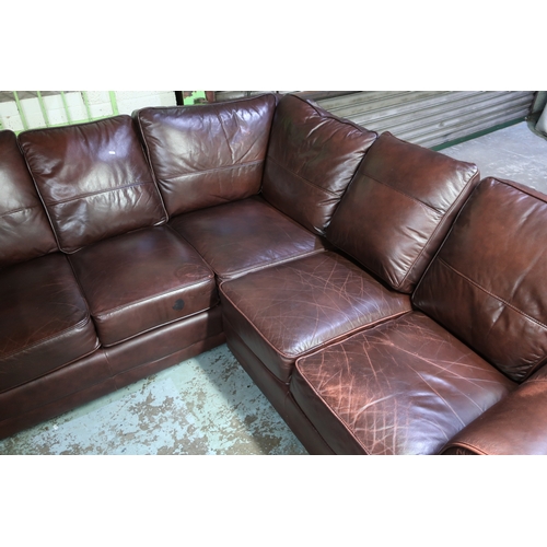 511 - Modern corner fitting settee upholstered in brown leather