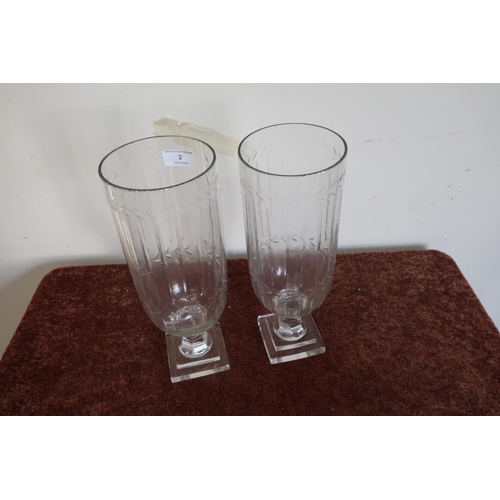 82 - Pair of glass vases with etched and fluted design and stepped square bases (34cm high)