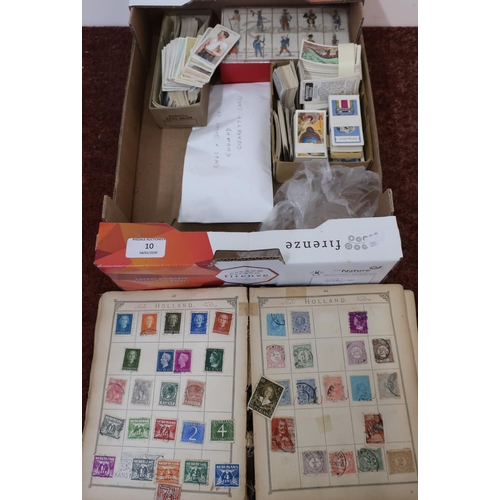 10 - Small stamp album containing a small selection of world stamps, various cigarette cards etc