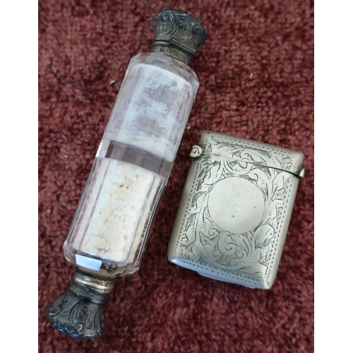 21 - White metal topped double ended glass scent bottle and a silver plated Vesta case (2)