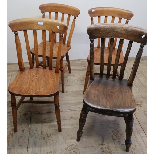 53 - Set of four similar elm country style kitchen chairs on turned supports
