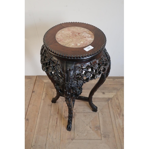 220 - Chinese hardwood jardiniere stand with inset hard stone panel to the top, with elaborately carved de... 