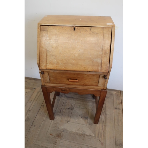 224 - Small walnut bureau with fall front revealing fitted interior of single drawer (width 53cm)