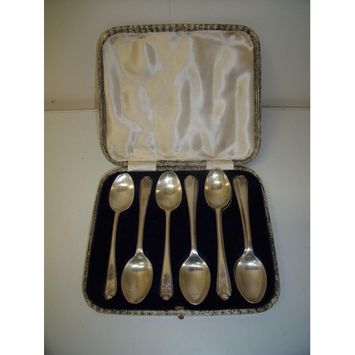 244 - Cased set of six silver hallmarked golfing teaspoons and four matching teaspoons (10)