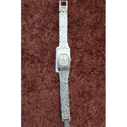 247 - Ladies Tissot wrist watch with rectangular face