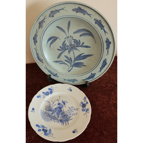 281 - Blue & white continental oriental style side plate and another with a border of fish and central flo... 