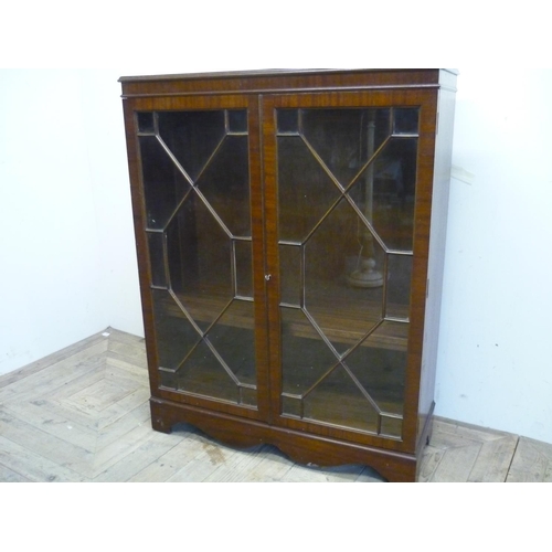 159 - Modern mahogany bookcase enclosed by two glazed cupboard doors (93cm x 35cm x 120cm)