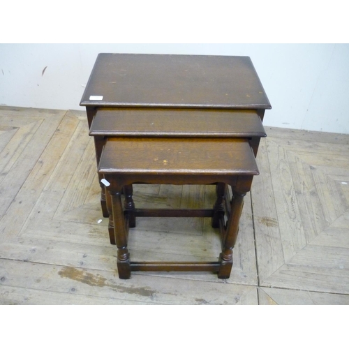 160 - Nest of three oak occasional tables