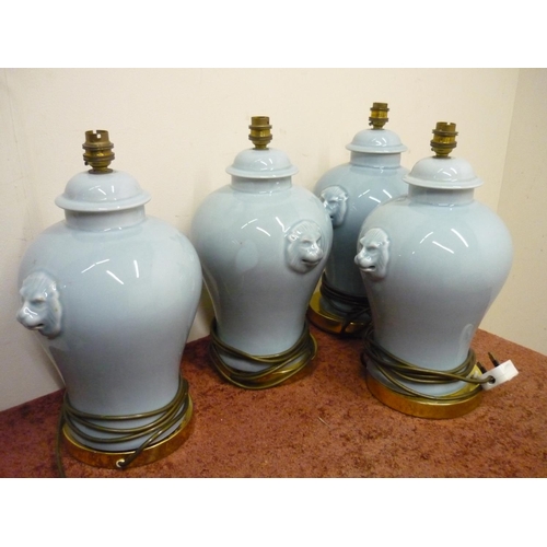 200 - Set of four ceramic table lamps with lion mask handles