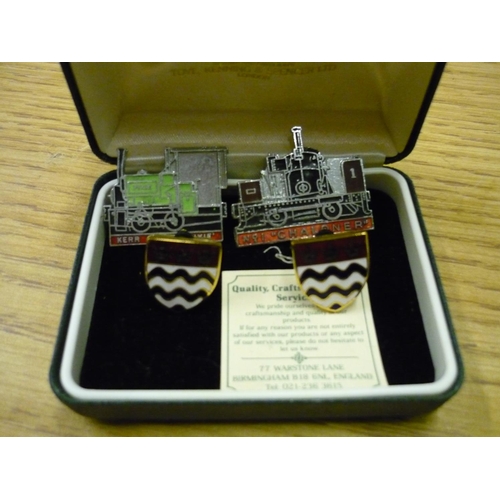 240 - Cased pair of enamel crested cuff-links and two railway related lapel badges